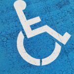 painted on the street a wheelchair logo
